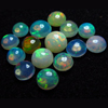 Ethiopian Opal - really - tope grade high quality CABOCHON - round shape mix lot - each pcs - have amazing - beautifull - flashy fire all around in the stone - size - 7 - 5 mm approx 15 pcs STUNNING QUALITY - VERY VERY RARE
